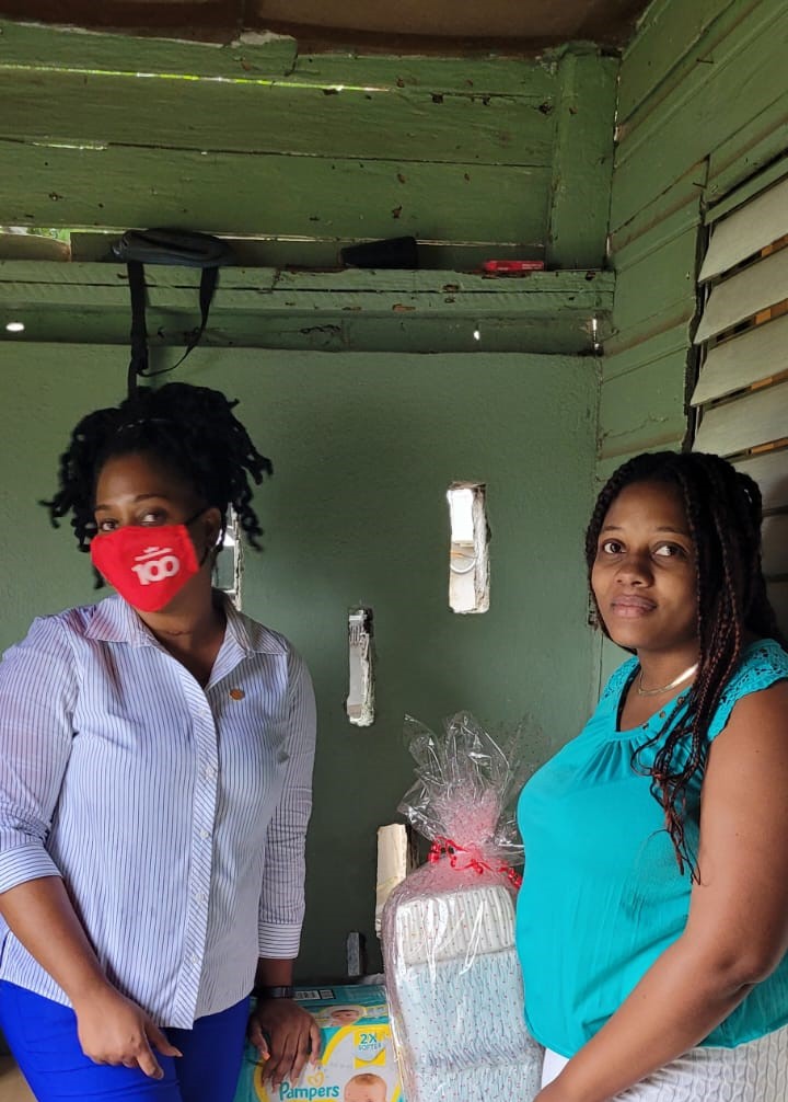 Grace & Staff Diaper donation to mother of triplets