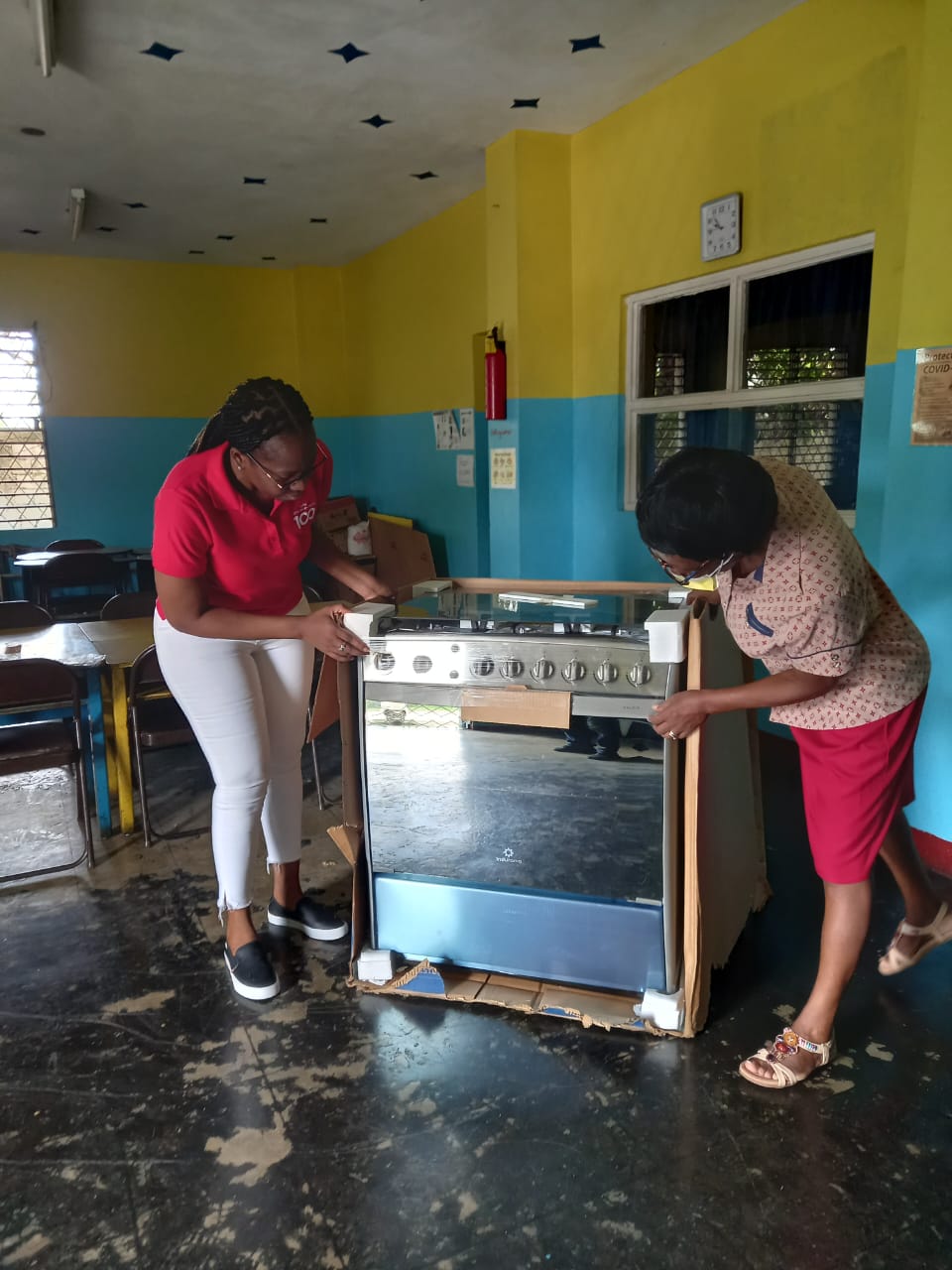 Grace & Staff Donation of Stove to Central Academy Basic
